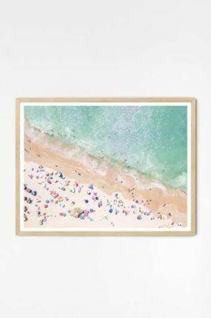 Зидна уметност уоквирена пастелним плажом