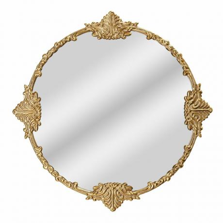 Округло украшено огледало са златним оквиром